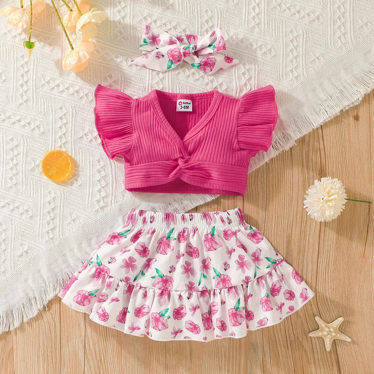 

3pcs Baby Girl 95% Cotton Rib Knit V Neck Twist Knot Flutter-sleeve Crop Top and Allover Floral Print Ruffle Hem Skirt with Headband Set