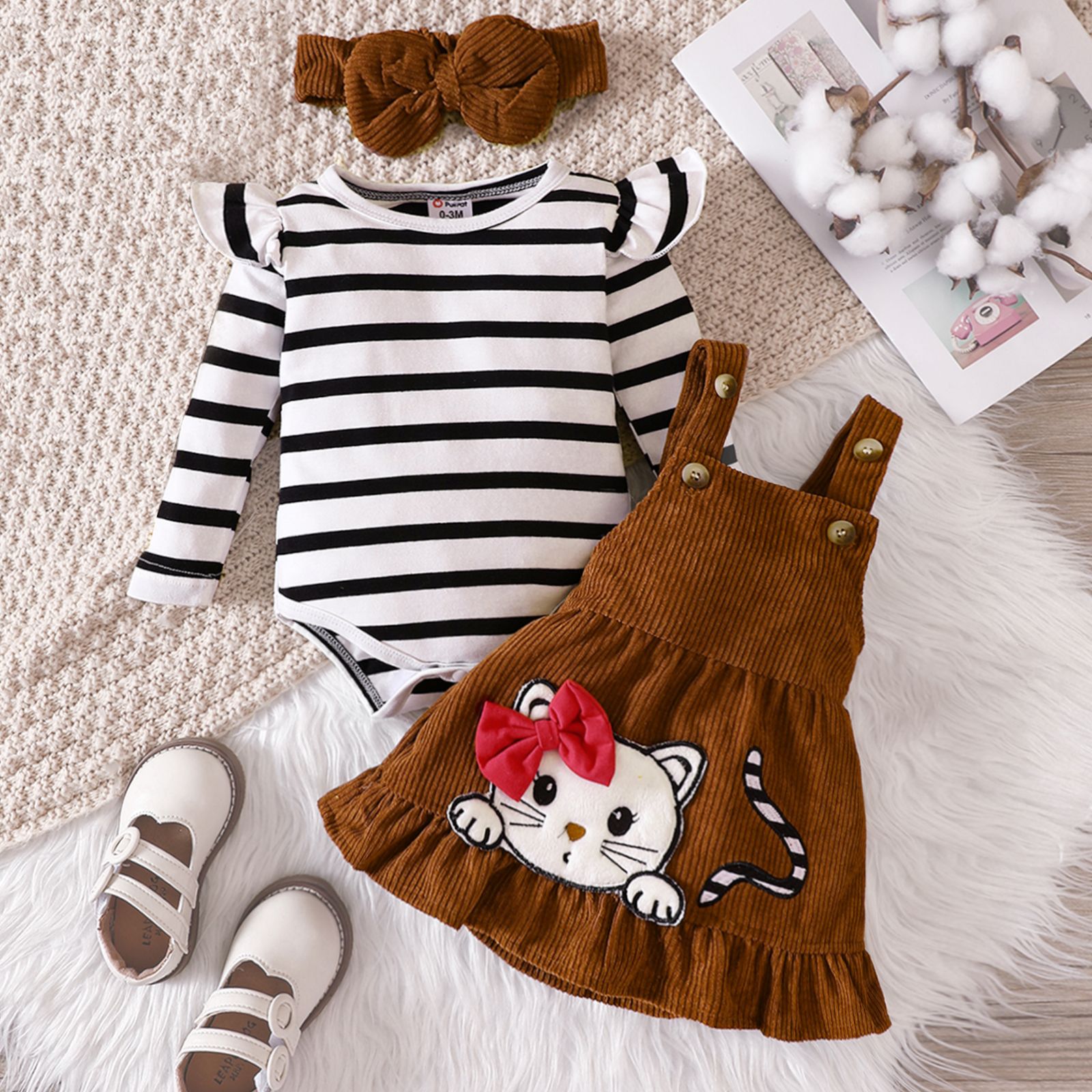 

3pcs Baby Girl Stripe Ruffle Long-sleeve Romper and Cat Embroidery Buttons Ribbed Strappy Ruffle Skirt & Headband Set