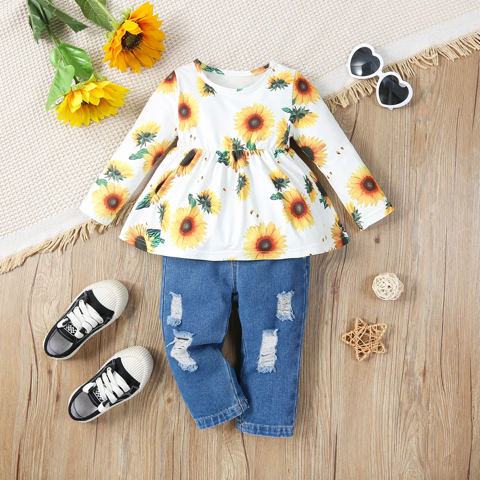 

2pcs Baby Girl Allover Sunflower Print Long-sleeve Top and Ripped Denim Jeans Set