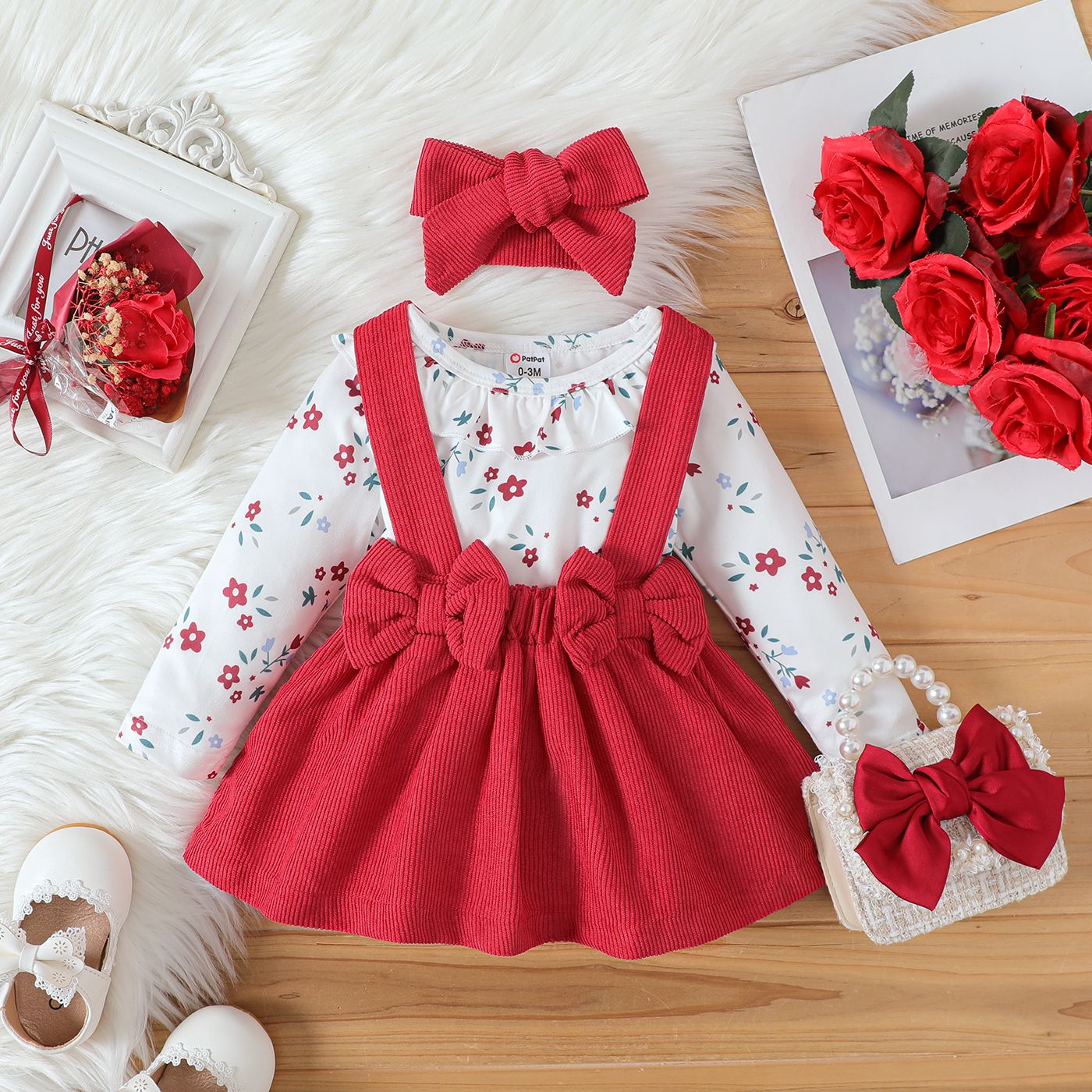 

3pcs Baby Girl Allover Floral Print Ruffle Collar Long-sleeve Romper and Red Corduroy Bow Front Suspender Skirt with Headband Set