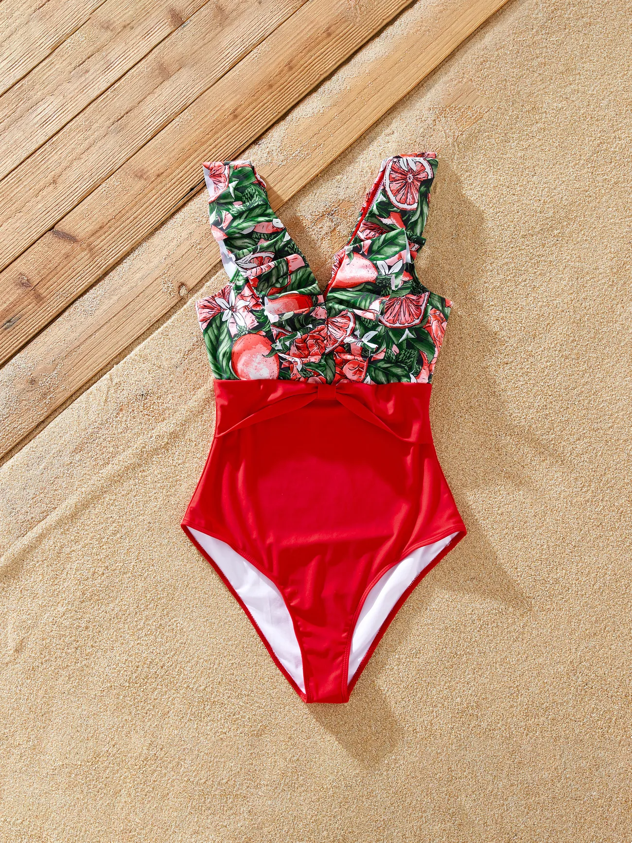 Family Matching Fruit Pattern Swim Trunks or Ruffle V-Neck Twist Knot Spliced Swimsuit
Family Matching Fruit Pattern Swim Trunks or Ruffle V-Neck Twist Knot Spliced Swimsuit