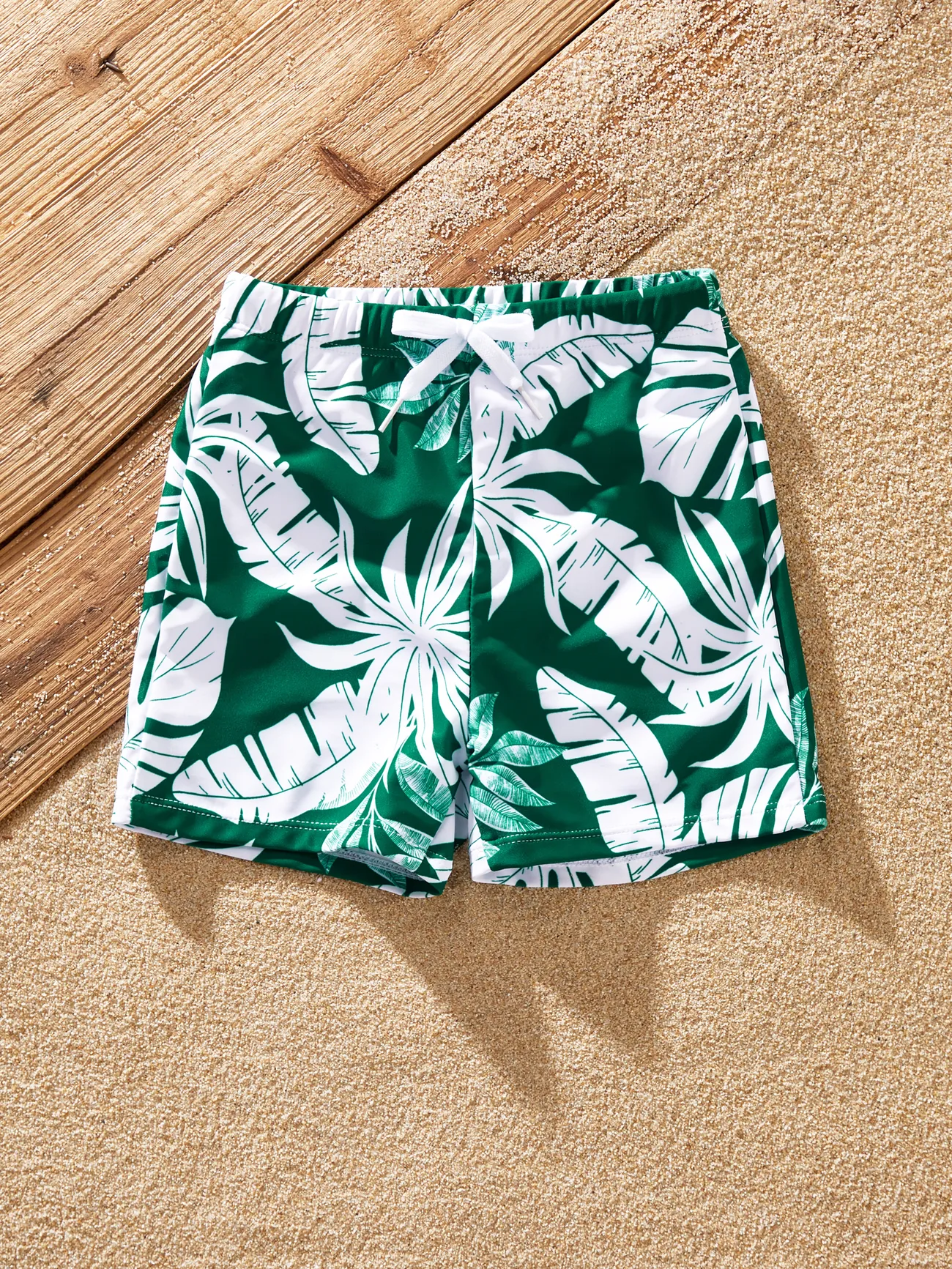 Family Matching Tropical Floral Swim Trunks and One-piece Swimsuit 
Family Matching Tropical Floral Swim Trunks and One-piece Swimsuit
