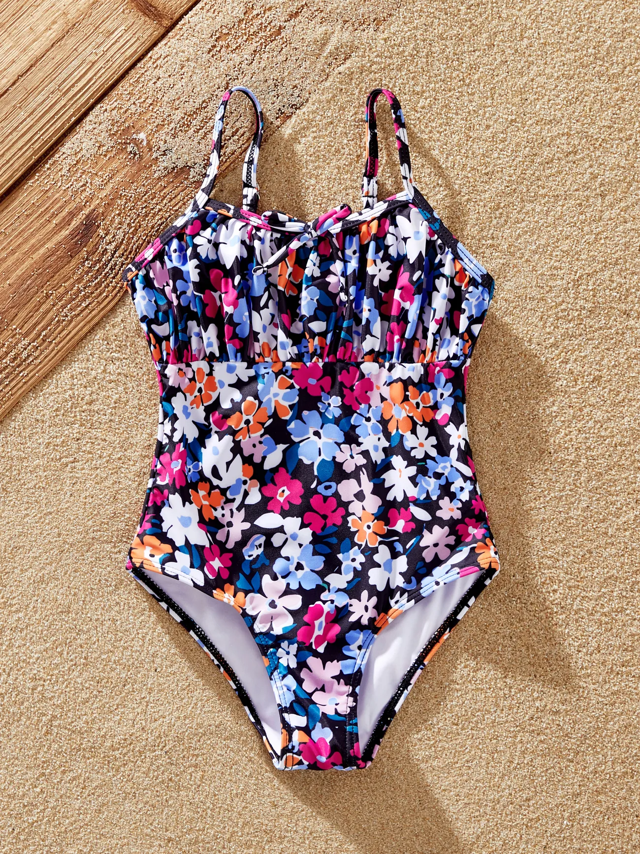 Family Matching Floral Print Swim Trunks or Ruffled Strappy One-Piece Swimwear
Family Matching Floral Print Swim Trunks or Ruffled Strappy One-Piece Swimwear