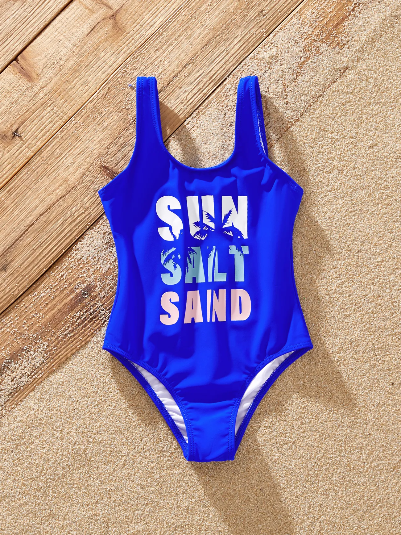 Family Matching Swimsuits 'Sun Salt Sand' Graphic Blue One-Piece Swimwear & Swim Trunks
Family Matching Swimsuits 'Sun Salt Sand' Graphic Blue One-Piece Swimwear & Swim Trunks