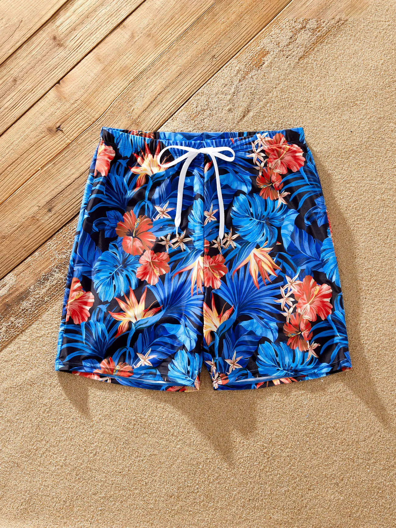 Family Matching Blue Tropical Floral Swim Trunks or Strappy Cross Two-piece Bikini
Family Matching Blue Tropical Floral Swim Trunks or Strappy Cross Two-piece Bikini
