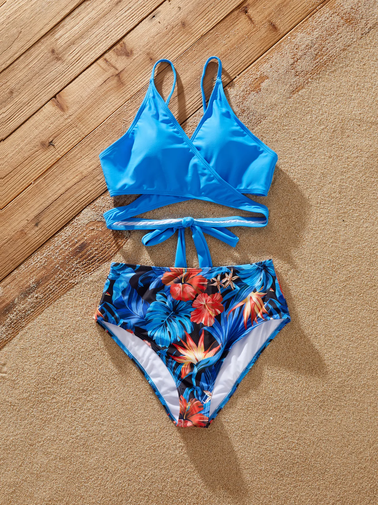 Family Matching Blue Tropical Floral Swim Trunks or Strappy Cross Two-piece Bikini 
Family Matching Blue Tropical Floral Swim Trunks or Strappy Cross Two-piece Bikini