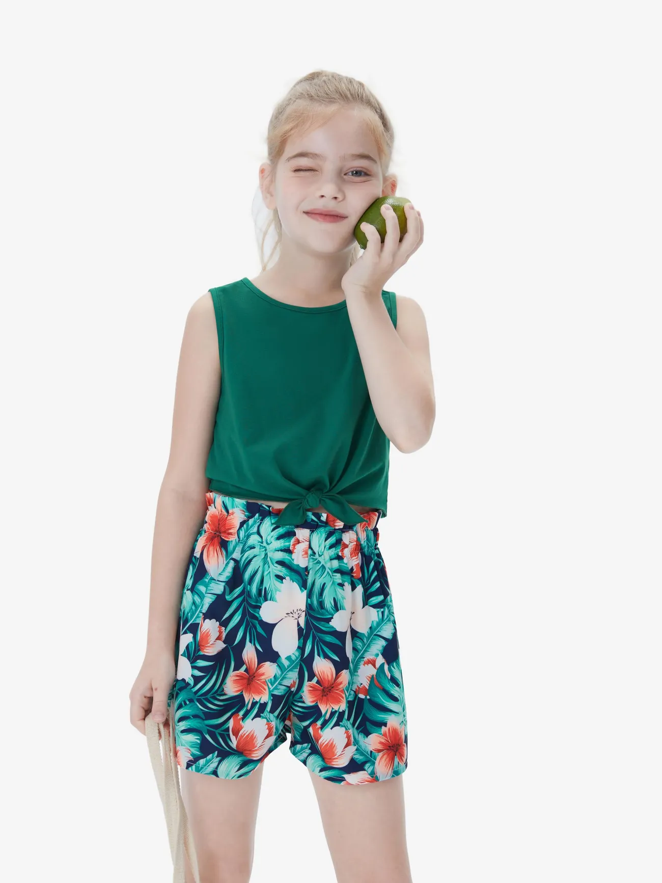 2-Piece Kid Girl Vacay Tank Top and Tropical Print Shorts Set
2-Piece Kid Girl Vacay Tank Top and Tropical Print Shorts Set