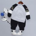 2-piece Toddler Boy 100% Cotton Star Camouflage Print Raglan Sleeve Pullover and Black Pants Set Color block