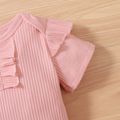 3pcs Baby Girl Solid Ribbed Short-sleeve Ruffle Romper and 100% Crepe Daisy Floral Print Bowknot Shorts with Headband Set Pink image 4
