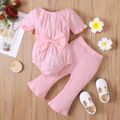 2pcs Baby Girl Solid Swiss Dot Ruffle Short-sleeve Bowknot Romper and Ribbed Bell Bottom Pants Set Pink
