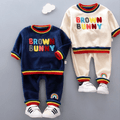 2pcs Toddler Boy Trendy Letter Terry Embroidered Striped Sweatshirt and Pants Set Beige