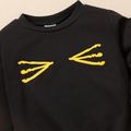 2pcs Toddler Boy Face Graphic Print Spike Design Pullover Sweatshirt and Elasticized Pants Set Black