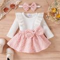 3pcs Baby Girl Solid Cotton Ribbed Ruffle Trim Long-sleeve Romper and Floral Textured Bow Front Skirt & Headband Set Pink image 1