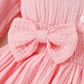 2pcs Baby Girl 95% Cotton Crepe Solid Ruffle Trim Bow Decor Long-sleeve Romper & Headband Set Pink image 4