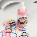 Bottled Multicolor Disposable Rubber Hair Ties for Girls with Milk Bottle Pink