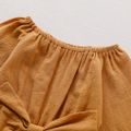 100% Cotton Solid Bowknot Decor Long-sleeve Baby Romper Ginger image 2