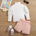 2pcs Toddler Girl Trendy Turtleneck Puff-sleeve Tee and Irregular Button Design Belted Shorts Set Pink image 3