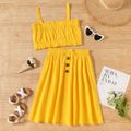 2-piece Kid Girl 100% Cotton Pleated Solid Tank Top and Bow Button Design Skirt Set Yellow