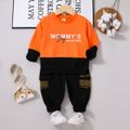 2pcs Toddler Boy Trendy Letter Print Colorblock Sweatshirt and Pocket Design Pants Set Orange image 1