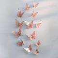 Confezione da 12 adesivi da parete con design a farfalla scavata 3D, decorazione per finestra del soggiorno, decorazione per la casa Rosa Dorato image 1