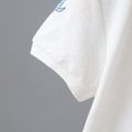 2pcs Toddler Boy Casual Dinosaur Print Polo Shirt & Spike Design Shorts Set White