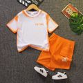 2pcs Toddler Boy Trendy Letter Print Colorblock Tee and Pocket Design Shorts Set Orange