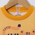 2pcs Toddler Boy Playful Ripped Denim Jeans and Animal Print Colorblock Sweatshirt Set Color block image 3
