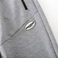 Trendy Kid Boy Letter Print Striped Zipper Pocket Elasticized Joggers Pants Sporty Sweatpants Light Grey image 3