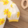 Baby Mädchen, strukturiertes Oberteil mit Puffärmeln und Blumendruck cremefarben