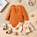 2pcs Baby Solid Long-sleeve Ribbed Romper and All Over Sun Print Skirted Shorts Set Ginger
