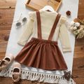 2-piece Toddler Girl Letter Print Ruffled Long-sleeve Top and Dog Footprint Brown Suspender Skirt Set Brown