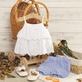 2pcs Baby Girl White Spaghetti Strap Hollow Out Layered Top and 100% Cotton Striped Shorts Set Color block image 1