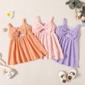 Baby Girl Solid Textured Sleeveless Bowknot Hollow Out Dress Orange image 2