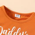 2pcs Kid Girl Letter Print Long-sleeve Orange Tee and Floral Print Flared Pants Set Orange
