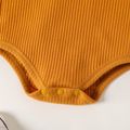 2pcs Baby Girl Solid Rib Knit Peter Pan Collar Short-sleeve Romper and Floral Print Shorts Set Yellow image 4