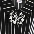 قطعتان من بدلة كيد بوي جنتلمان ، قميص بتصميم ربطة عنق وياقة مخططة ومجموعة بنطال بحمالة أسود