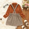 2pcs Toddler Girl Turtleneck Ribbed Long-sleeve Tee and Button Design Plaid Suspender Skirt Set Brown image 2