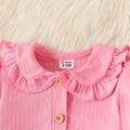 2pcs Baby Girl Allover Floral Print Tank Dress and Solid Rib Knit Ruffle Collar Long-sleeve Button Front Cardigan Set Pink image 4