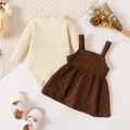 2pcs Baby Girl 95% Cotton Long-sleeve Rib Knit Romper and Quilted Textured Overall Dress Set Brown