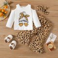 3pcs Baby Girl 95% Cotton Cold Shoulder Long-sleeve Graphic Tee and Leopard Print Flare Pants with Headband Set White image 1