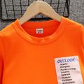 2pcs Kid Boy Letter Print Splice Pullover Sweatshirt and Black Pants Set Orange