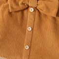 2pcs Toddler Girl Ruffled Ribbed Black Tee and Bowknot Button Design Skirt Set Brown image 5