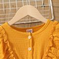 2pcs Kid Girl Ruffled Button Design Long-sleeve Tee and Floral Print Leggings Set Yellow image 2
