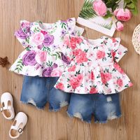 2pcs Baby Girl 95% Cotton Ripped Denim Shorts and Allover Floral Print Ruffle Short-sleeve Top Set