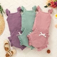 2pcs Baby Girl 95% Cotton Ribbed Flutter-sleeve Romper and Ruffle Shorts Set