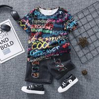 2pcs Toddler Boy Trendy Patchwork Ripped Denim Shorts and Letter Print Shorts Set