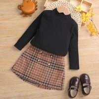 2-piece Toddler Girl Mock Neck Ribbed Long-sleeve Black Top and Button Design Plaid Skirt Set