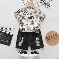 2pcs Kid Boy Letter Print Short-sleeve Tee and Patch Ripped Denim Shorts Set