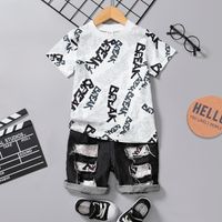 2pcs Toddler Boy Trendy Ripped Denim Shorts & Letter Print Tee Set