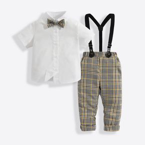2pcs Solid Lapel Collar Bow Tie Decor Short-sleeve White Shirt and Plaid Print Khaki Overalls Toddler Set
